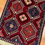 tappeto persiano rosso ciliegia